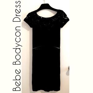 New Bebe Black Bodycon Black Dress with short Sleeves and cut out details
